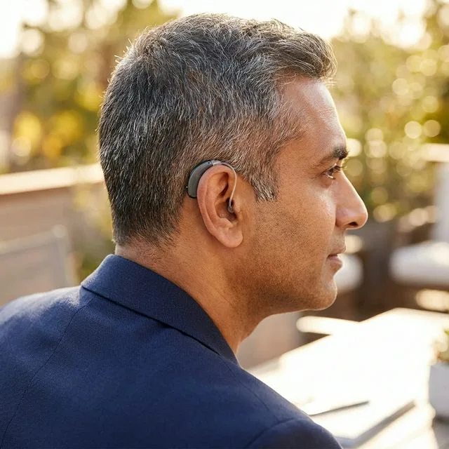 Person wearing RIC Hearing Aid